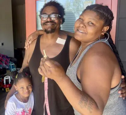 Image of smiling family