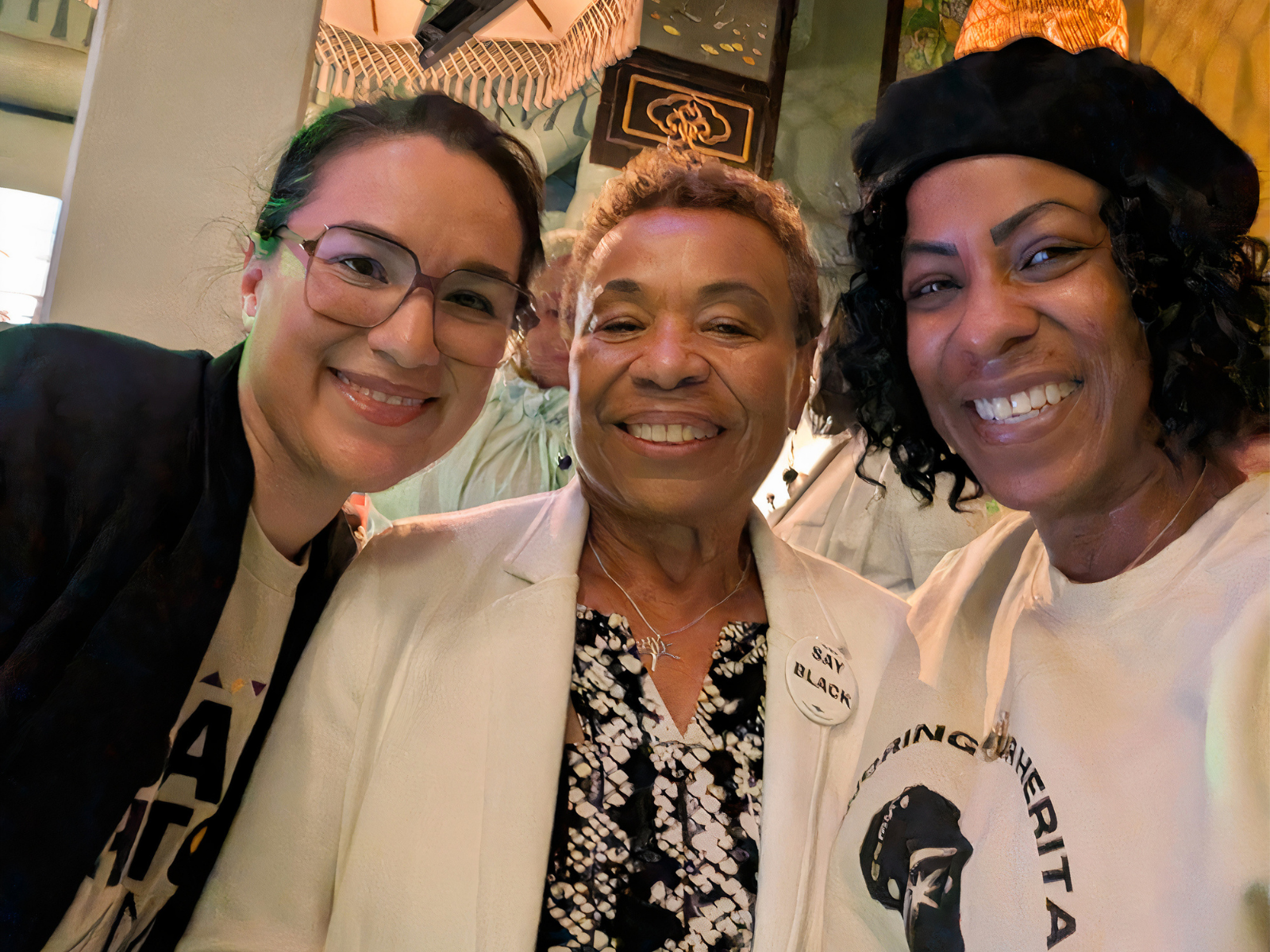 Lauren standing with Mayor Barbara Lee and SEIU 1021 Vice President Kristin Hardy at a Black History Month celebration in Oakland.