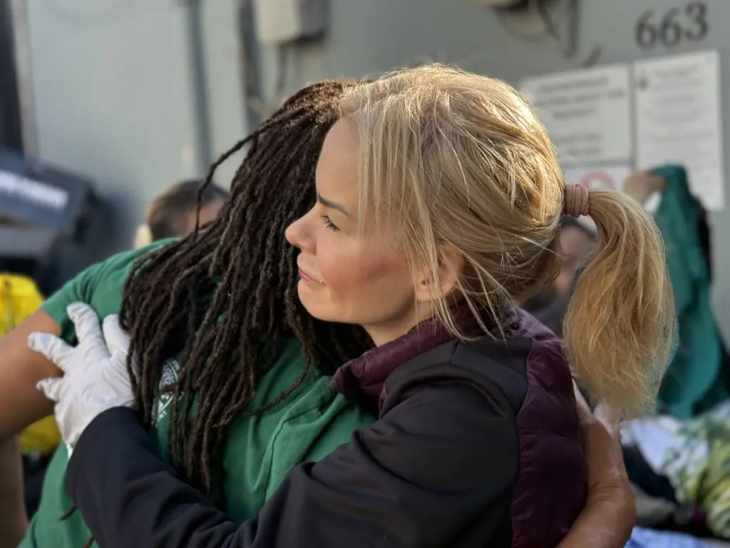 Two women hugging