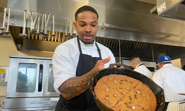 A worker in the Bread and Roses Cafe.