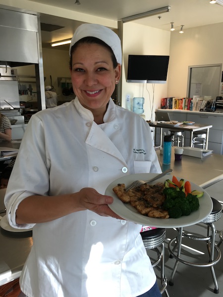 chef holding plate