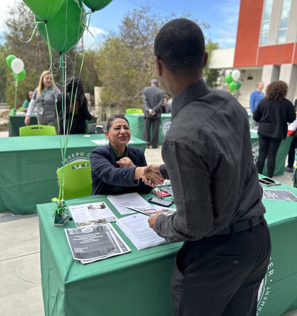 Community outreach led by St. Joseph Center, illustrating lived experience in action.
