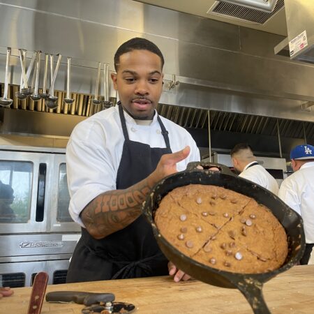 Bread & Roses student presenting a fresh skillet dessert