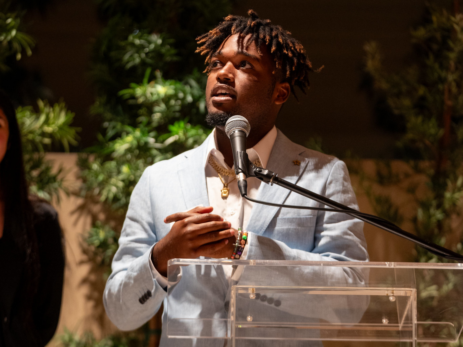 Malik Jackson speaking at a community event