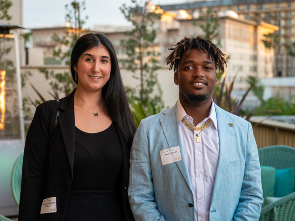 Malik Jackson with St. Joseph Center case manager Melodie Vatandoust at a community event.
