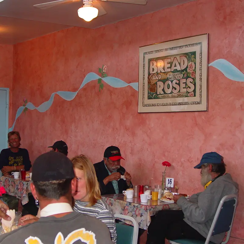 sjc-bread-and-roses-cafe-clients-eating