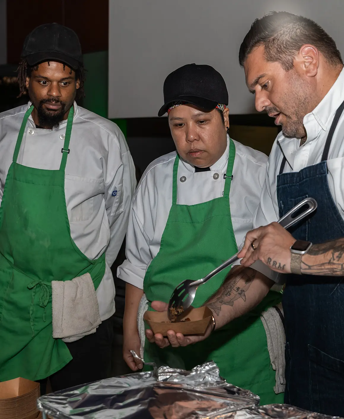 Chef teaching Bread and Roses students.
